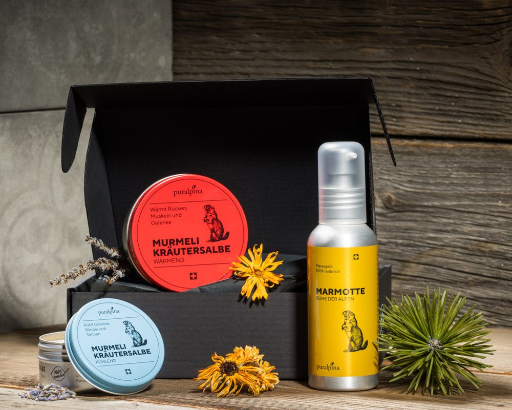 Puralpina Murmeli alpine herbal balm gift set with warming and cooling tins and massage oil